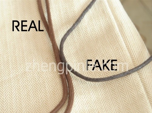 真假hermes防尘袋的绳子对比