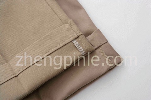 真假Dickies工装裤的裤脚内走线对比