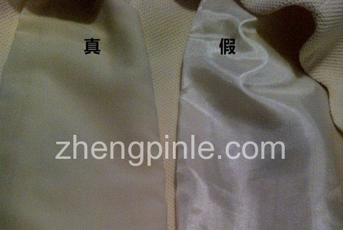 真的欧时力里衬面料舒适顺滑透气，假的则明显要劣质一些