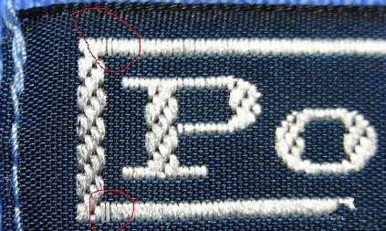 四格跳线,在主标绣线的四个角有明显的跳线